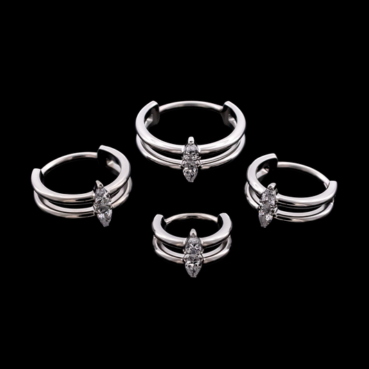 Blair- titanium hinged rings on black ground