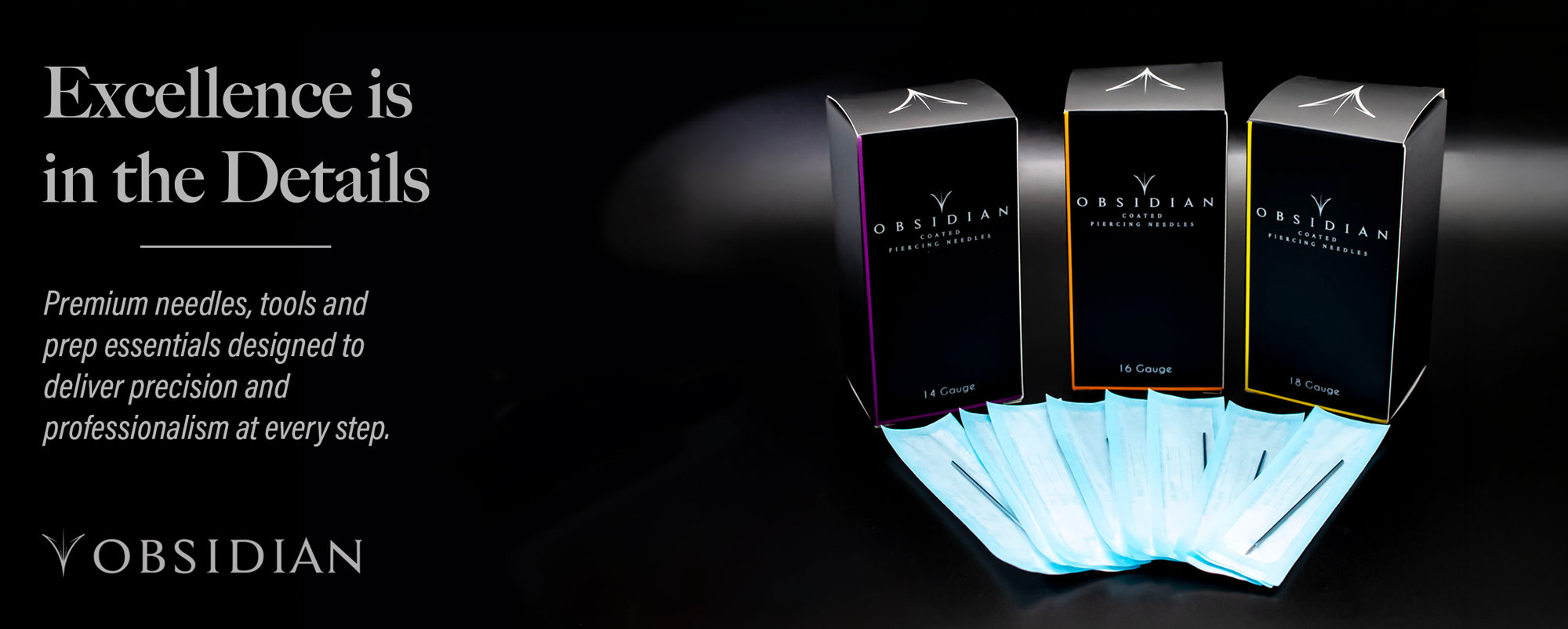 Obsidian premium piercing needles in various sizes on a black background